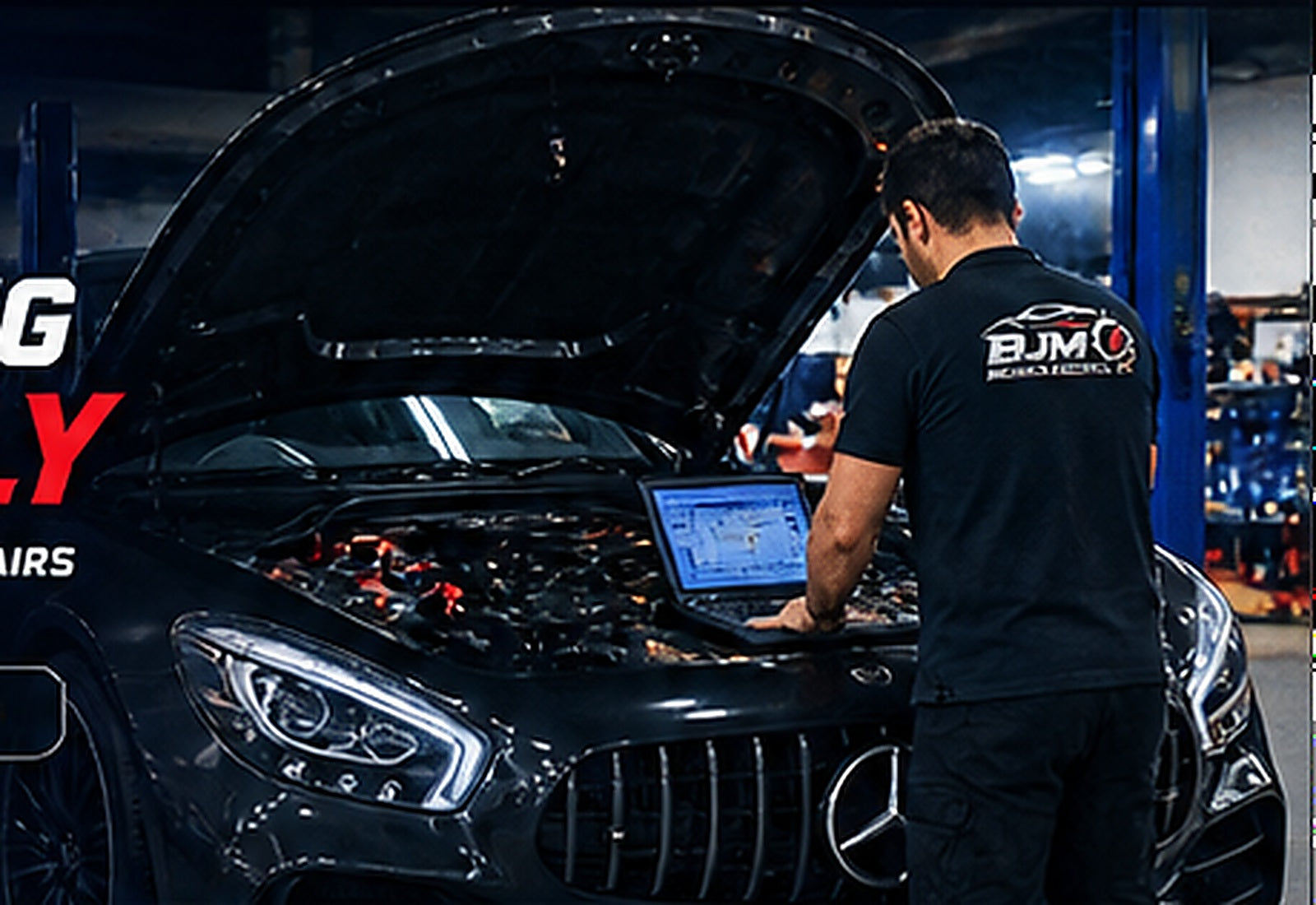 Automotive technician diagnosing a vehicle in a modern workshop